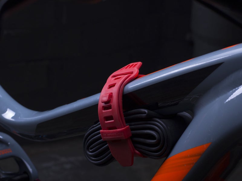 All Mountain Style MTB Tube Strap â€“ Lightweight, No-Velcro Bike Frame Strap for CO2, Tire Levers & Tube â€“ Universal Fit, Weather-Resistant TPE Material - Red Color - Image 3